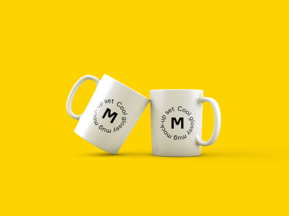 Download Two Mugs On Yellow Background Mockup Free Mockup