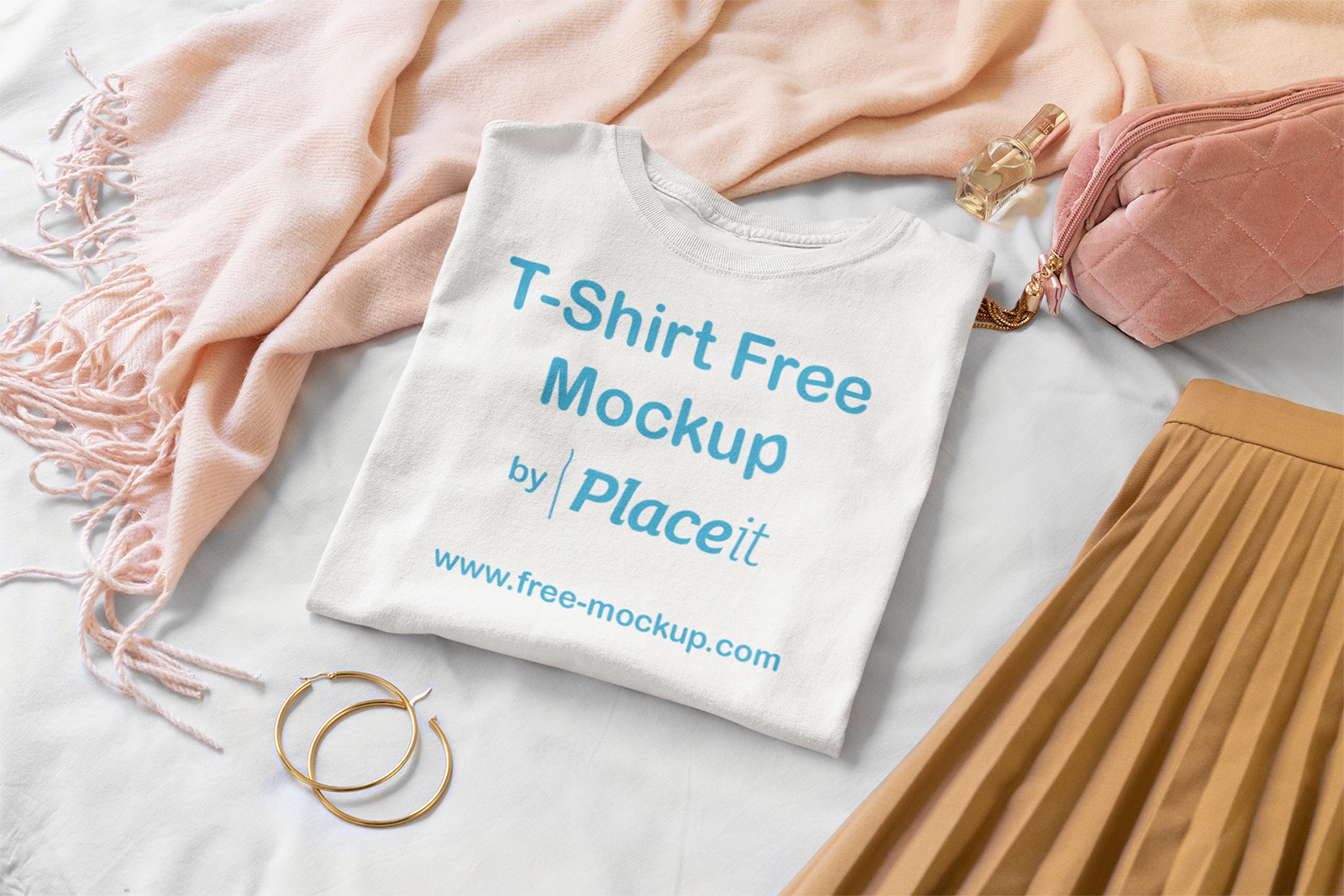 Folded T Shirt Mockup Surrounded By Girly Garments Free Mockup
