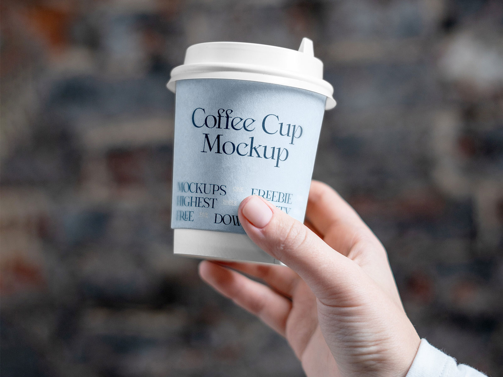 https://www.free-mockup.com/wp-content/uploads/edd/2023/01/Coffee-Cup-in-Hand-Branding-Mockup-Free-for-Download.jpg