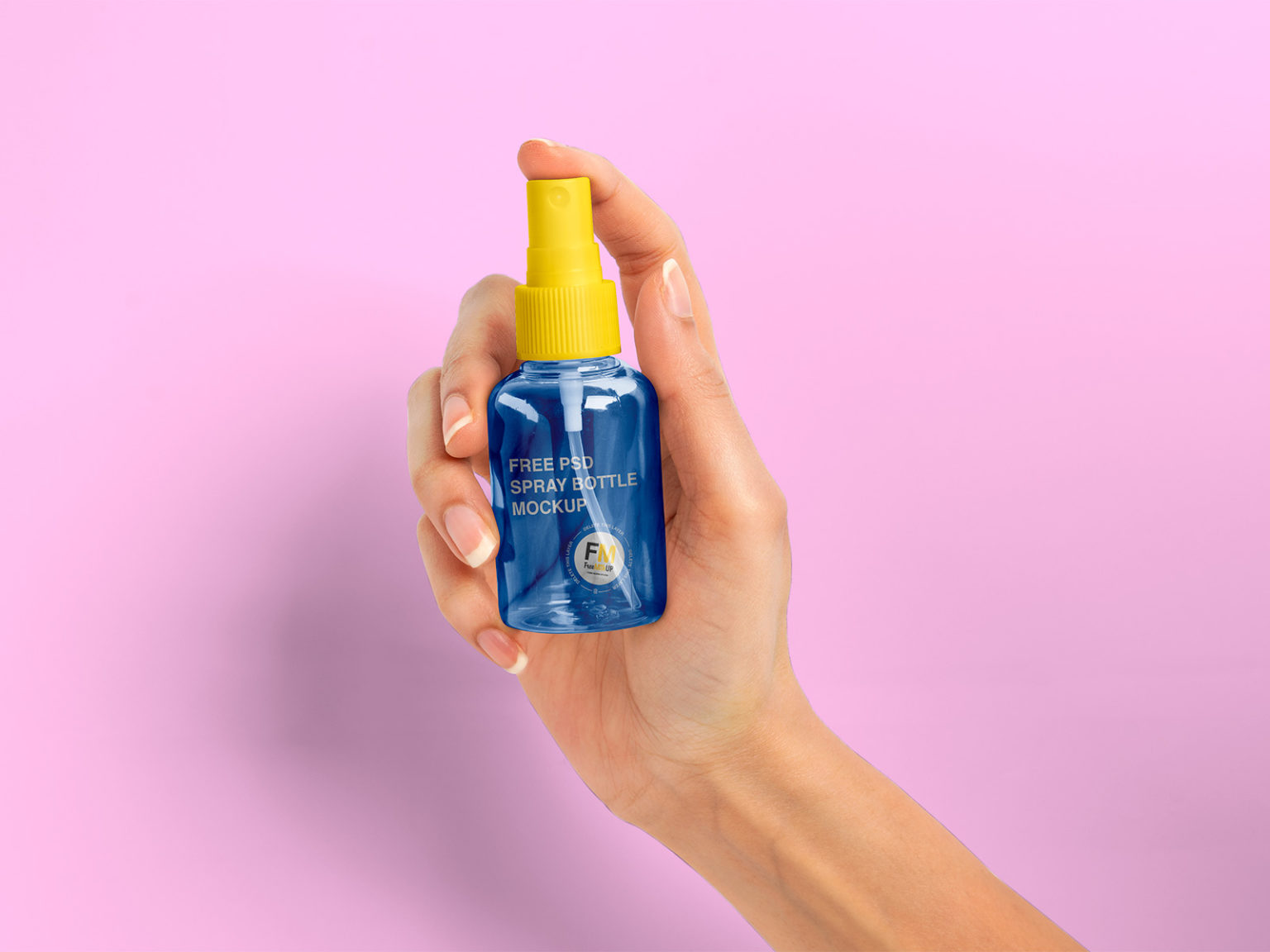 Free Spray Bottle in Woman Hand Mockup PSD | The Free Mockup