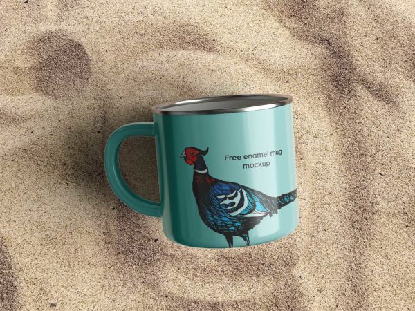 Free enamel mug mockup on sand