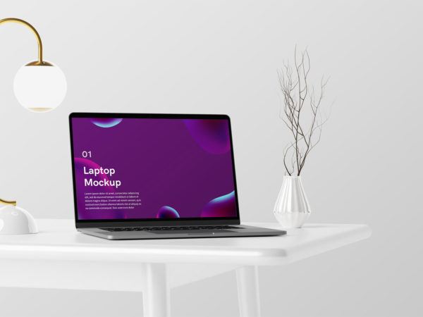 Free laptop UI/UX mockup in minimalist interior