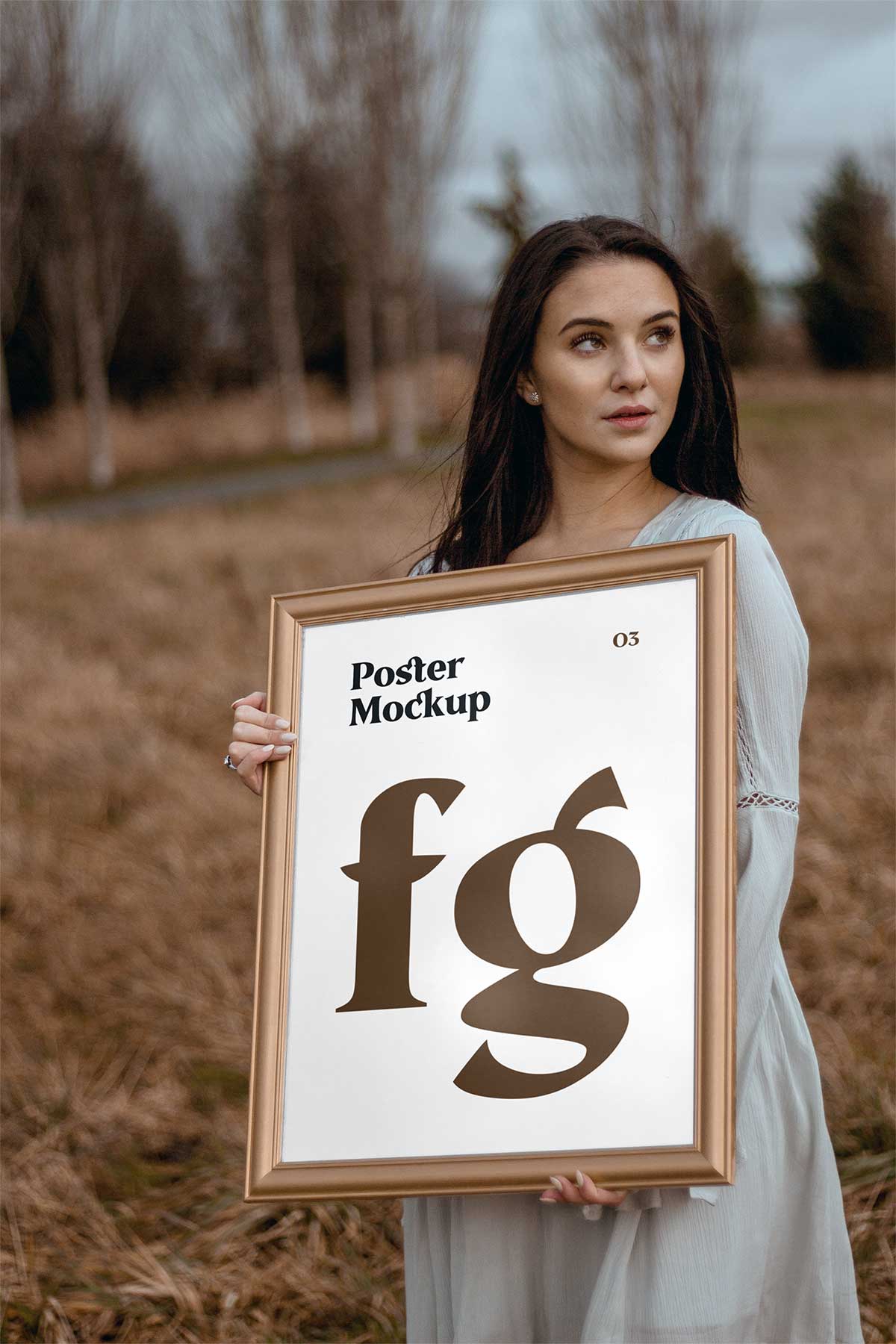 Woman holding poster frame mockup