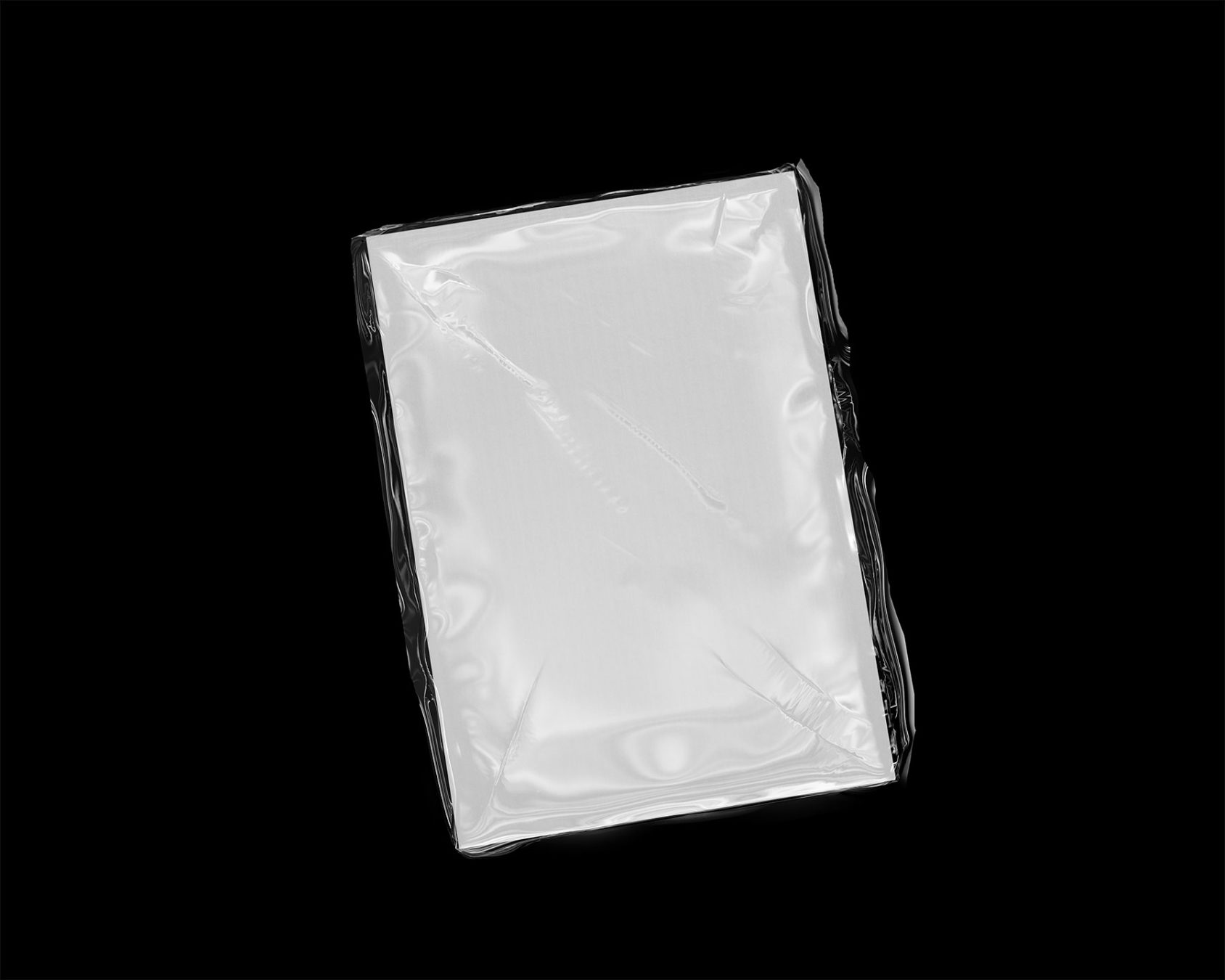 Magazine Mockup Wrapped in Transparent Plastic