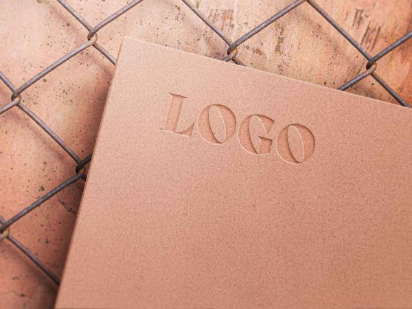 Debossed Logo Mockup on Paper Texture