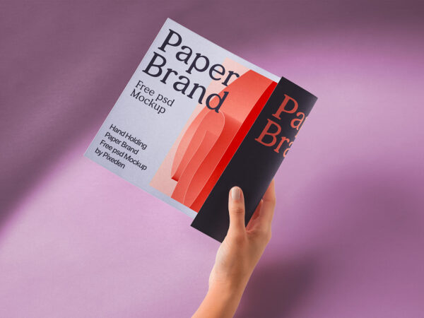 Hand Holding Brand Paper Mockup